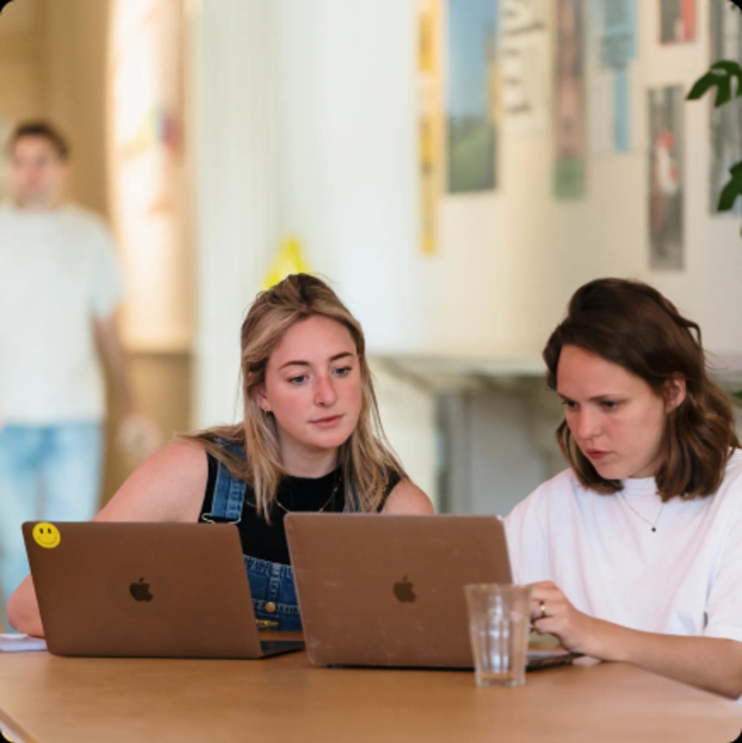 Three people brainstorming together